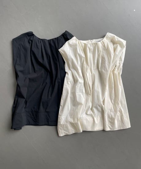 tucked shoulder sleeveless blouse