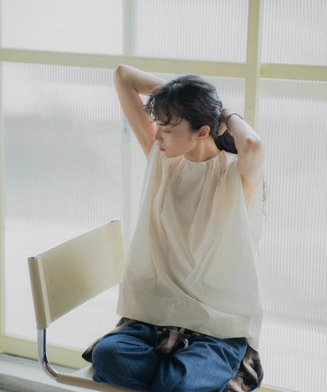 tucked shoulder sleeveless blouse