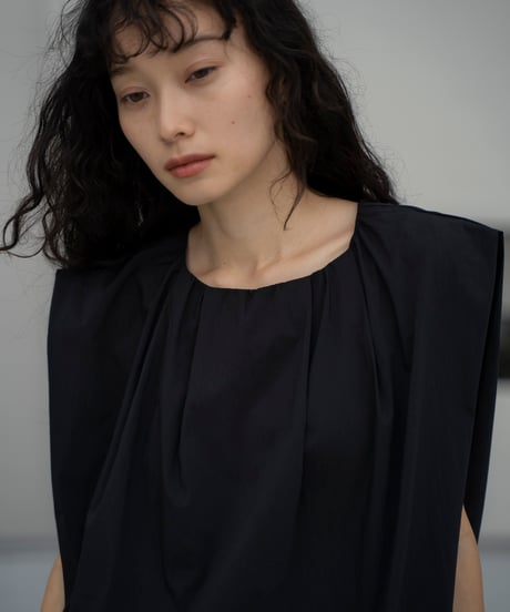 tucked shoulder sleeveless blouse