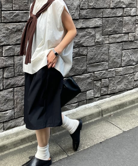tucked shoulder sleeveless blouse