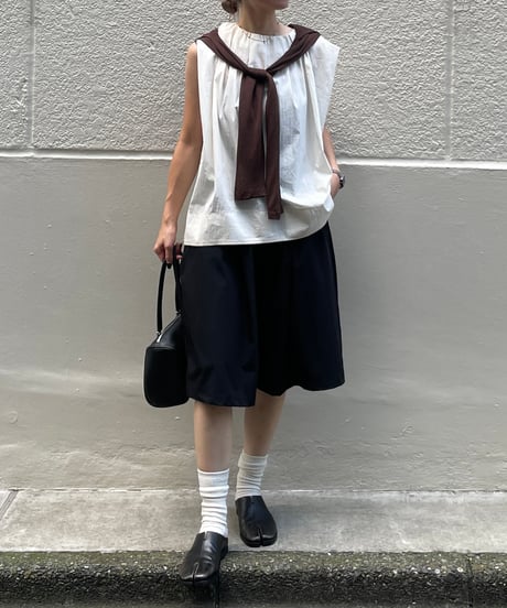 tucked shoulder sleeveless blouse