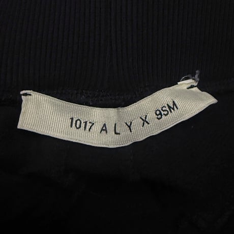 【USED】1017 ALYX 9SM 21AW–22SS Studded Destroyed Sweat Track Pants Black