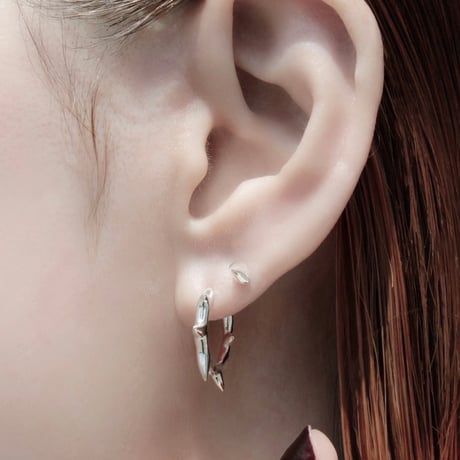 Raw edge spike pierce