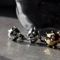 Raw edge pierce