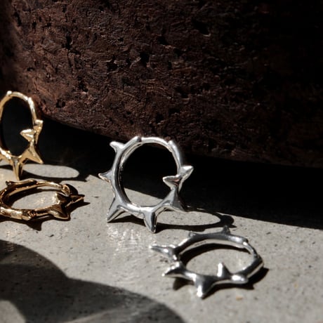 Raw edge hoop pierce