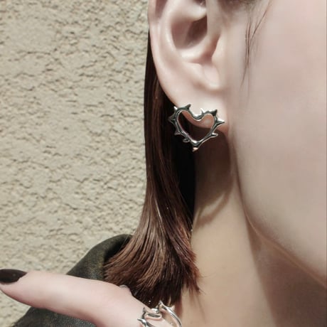 Raw edge heart pierce