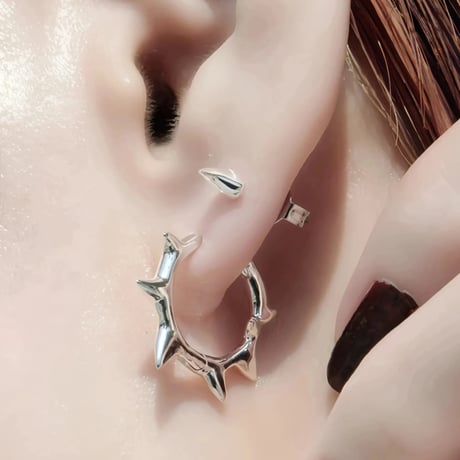 Raw edge hoop pierce