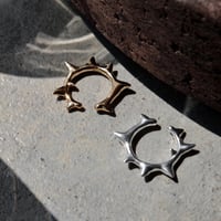 Raw edge earcuff