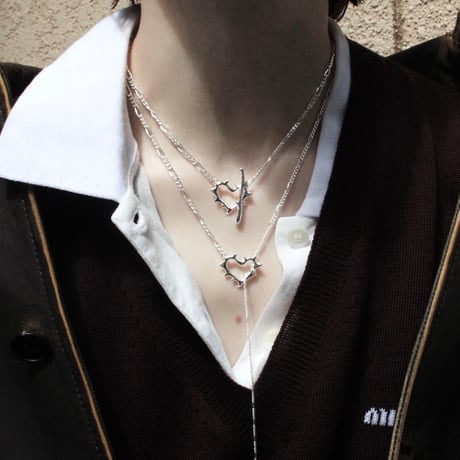 Raw edge heart necklace