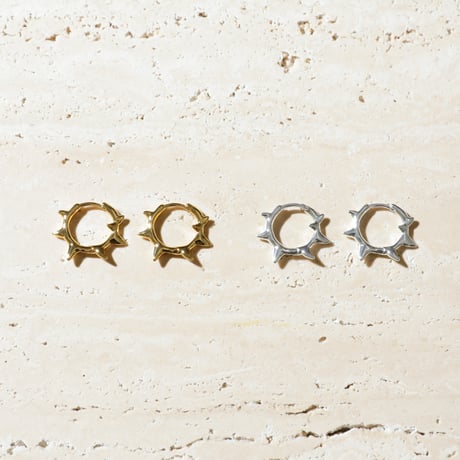 Raw edge hoop pierce