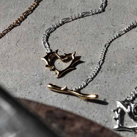 Raw edge heart necklace