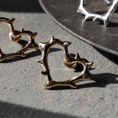 Raw edge heart pierce