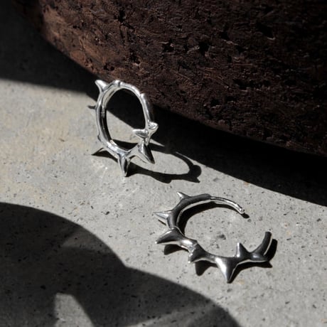Raw edge hoop pierce
