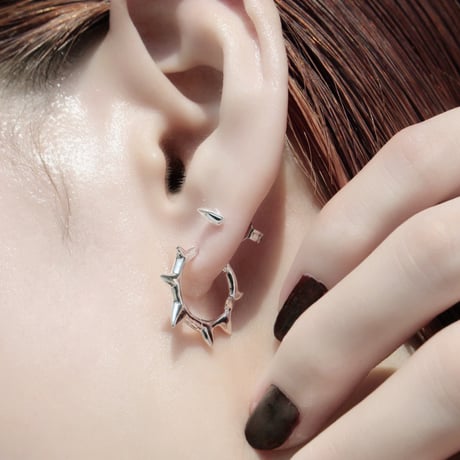 Raw edge hoop pierce