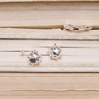 Raw edge pierce