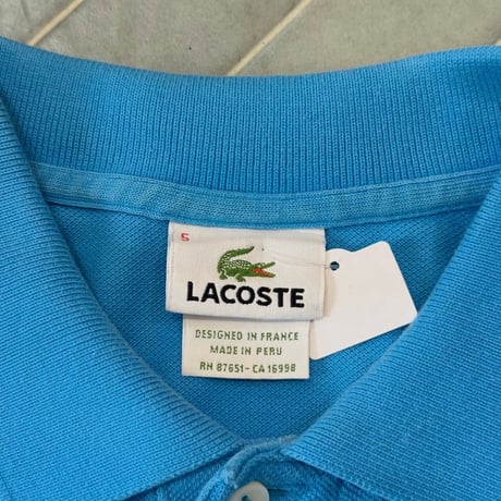 LACOSTE 水色ポロシャツ