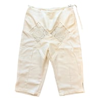 LACE BLOCK SOIL CAPRI PANTS