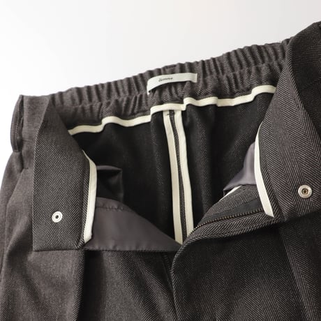 AMNE "HERRINGBONE PEG TOP SLACKS" 2COLORS