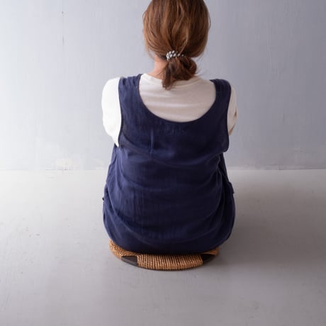 丸い木板をベースに仕立てた藁細工のアートな円座/st.1383