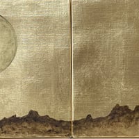 山の上の月