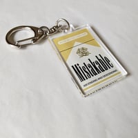 DONATION（寄付2,000円）→アクリルキーホルダー：MISTAKABLE（ゴールド）