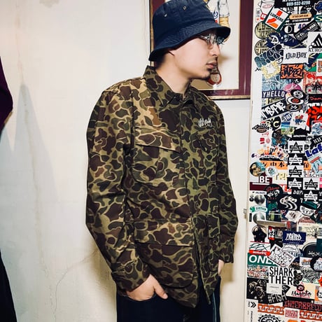 BOB MARLEY × POT MEETS POP ARMY JACKET (DUCK HUNTER CAMO)｜ボブ・マーリー × ポットミーツポップ アーミージャケット (ダックハンターカモ)