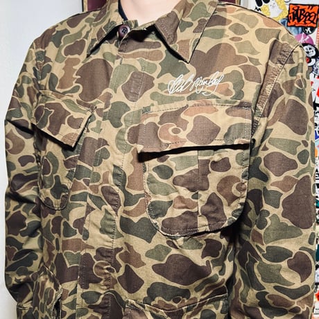 BOB MARLEY × POT MEETS POP ARMY JACKET (DUCK HUNTER CAMO)｜ボブ・マーリー × ポットミーツポップ アーミージャケット (ダックハンターカモ)
