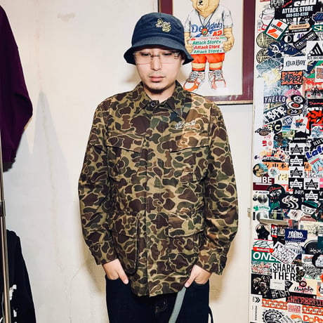 BOB MARLEY × POT MEETS POP ARMY JACKET (DUCK HUNTER CAMO)｜ボブ・マーリー × ポットミーツポップ アーミージャケット (ダックハンターカモ)