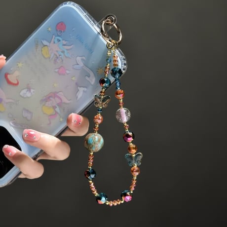 木星とクリスタル スマホストラップ 蝶 チャーム 高級感 お洒落  女子力アップ  iPhone、Xperia、Google Pixe、AQUOS、Xiaomi、Galaxy  [M6686]