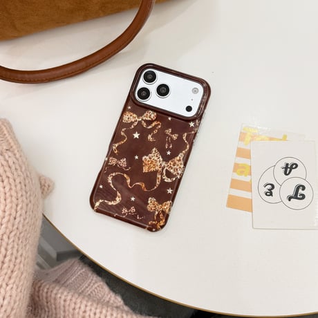 ヒョウ柄リボン iPhone18Pro/18ProMax スター ブラウン iPhone17/16/15Proカバー 大人かわいい [M6884]