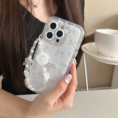 リボン柄 iPhone17Pro/17ケース 花ストラップ iPhone16Pro/15ProMaxケース カメラ保護カバー ホワイト[M6564]