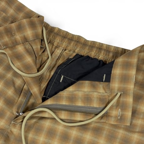 坩堝 (RUTSUBO) | MADRAS THECK MODERN WIDE EASY TROUSERS(BROWN)