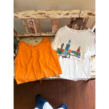 orange sleeveless tops