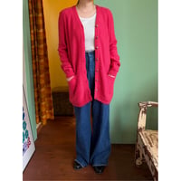 pink knit cardigan