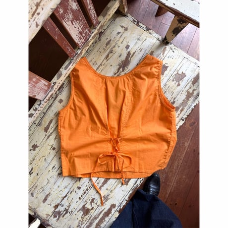 orange sleeveless tops