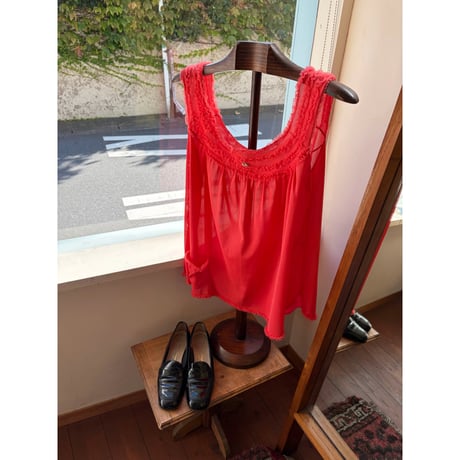 see-through sleeveless tops