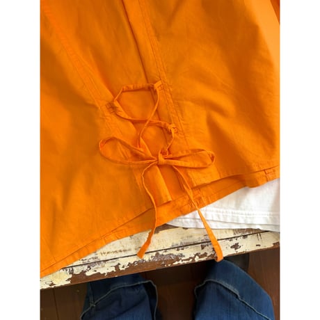 orange sleeveless tops