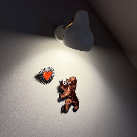 熊とピカーッと光るハート