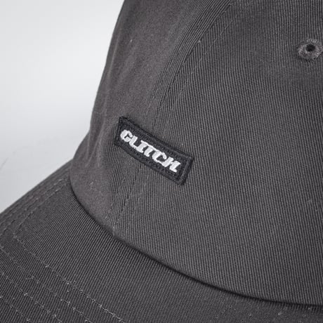 GLITCH LOGO Woven Label Cap【Faded Black】