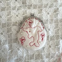 amulet stitch pouch