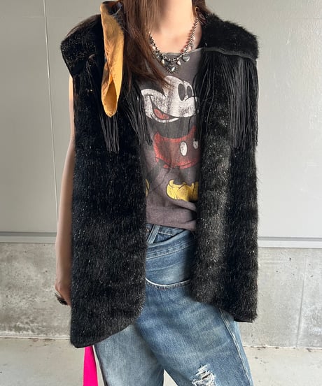 light fur fringe vest.