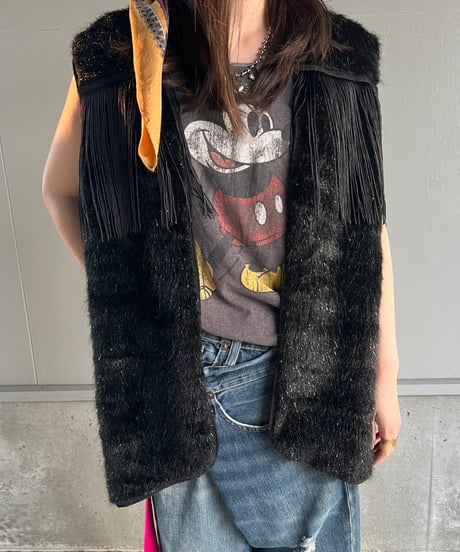 light fur fringe vest.