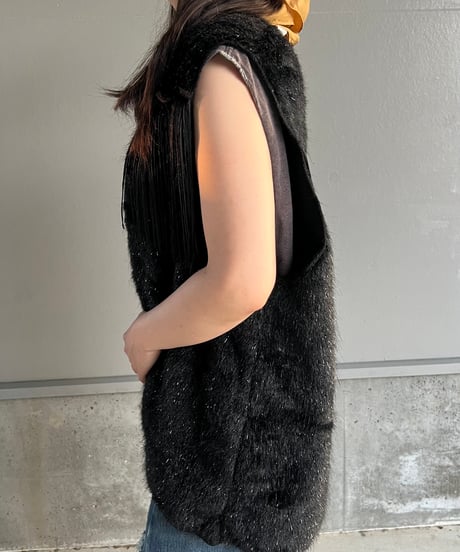 light fur fringe vest.