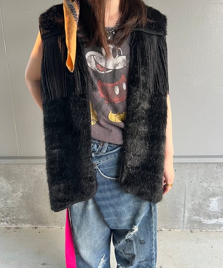 light fur fringe vest.