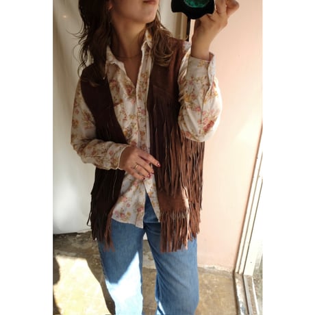 brown leather vest