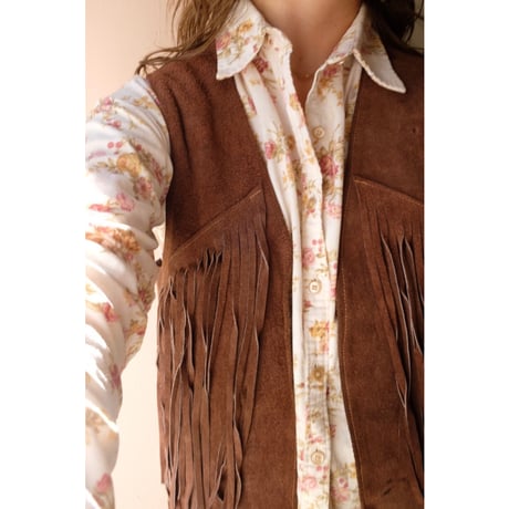 brown leather vest