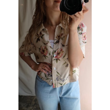 beige flower shirt