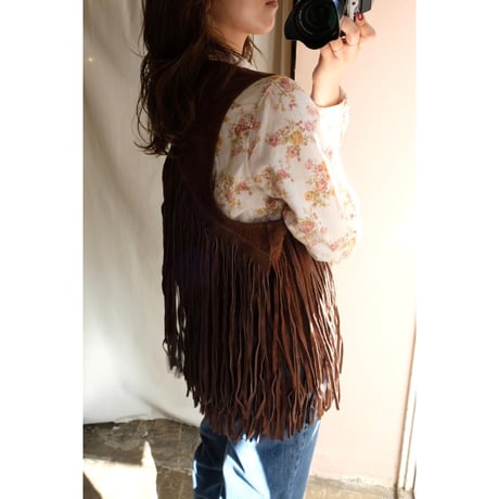 brown leather vest