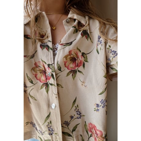 beige flower shirt