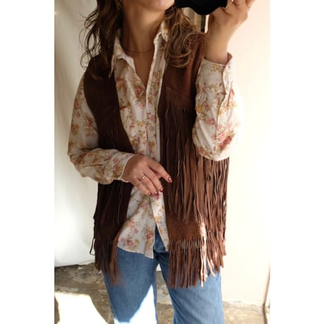 brown leather vest